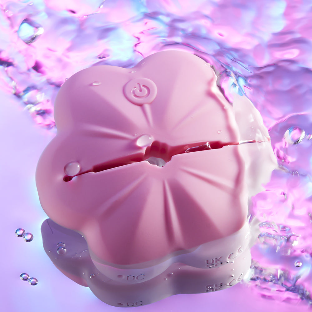 Joylume Electric Monarch nipple clamps displayed in hand for size and detail reference