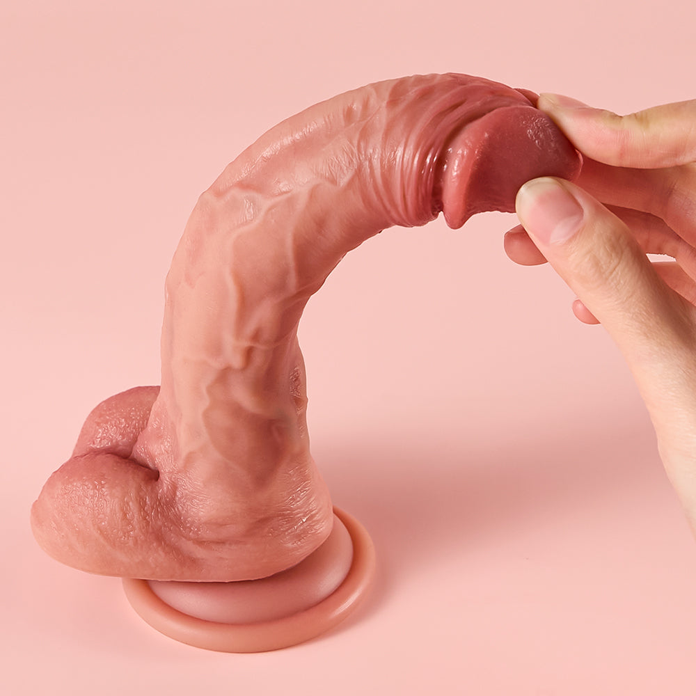 Joylume Constant Touch strap on compatible silicone dildo shown in lifestyle setting