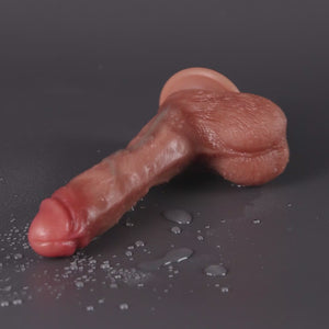 Joylume Big Spray dildo demonstrating built in water injection squirting feature