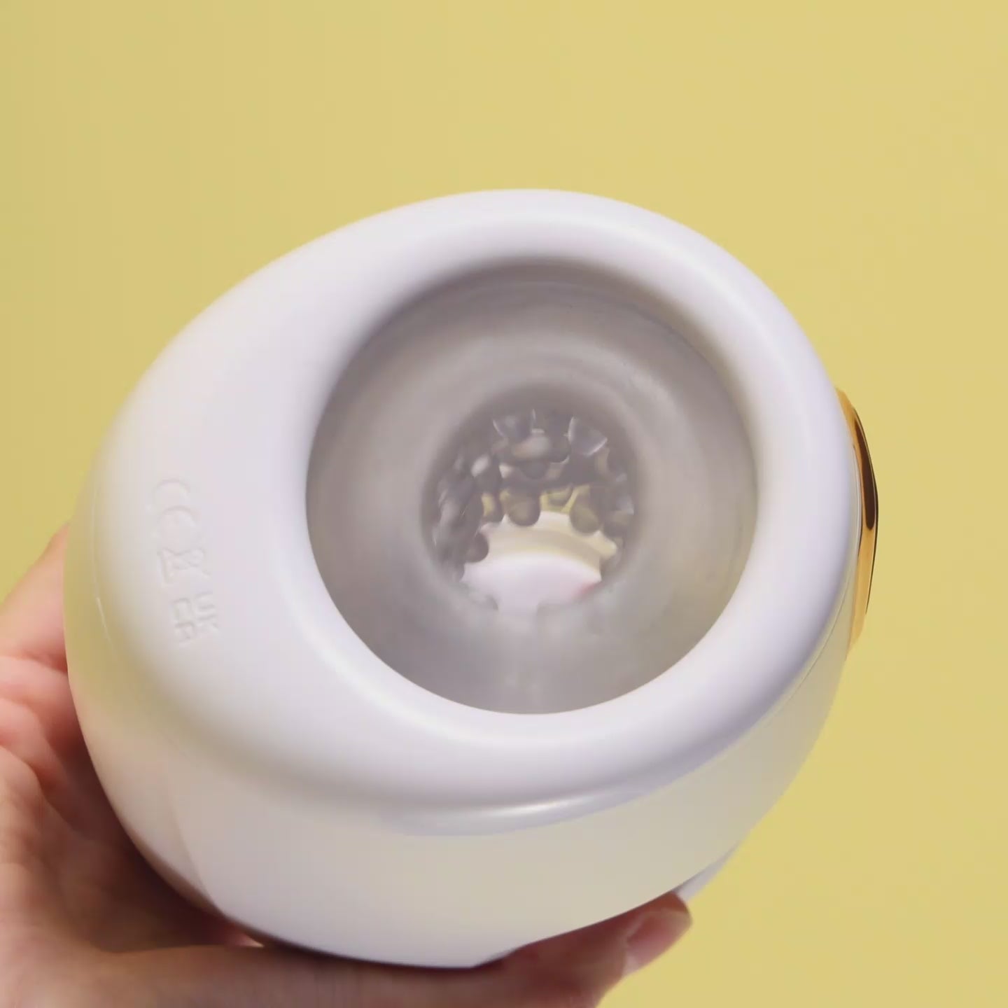 Joylume Power Stroke male masturbator demonstrating tongue licking motion